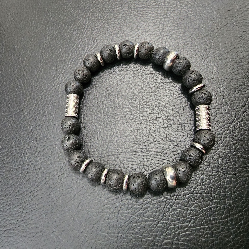 Men Bracelet made with stainless steel material and natural stones.